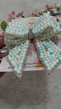Load and play video in Gallery viewer, Celeste Pearl Bow Light Blue